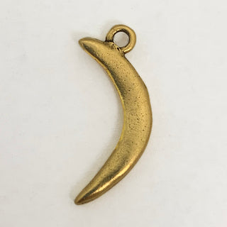 Front side of gold tone crescent shaped charm.