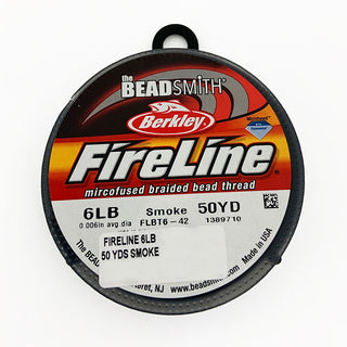 A 50yd spool of 6lb Smoke Fireline bead thread.