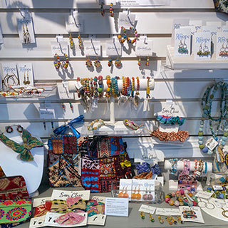 Fair trade items including jewelry, embroider bags, headbands, soapstone carvings, etc.