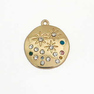 Gold plated round charm with 15 colored and clear crystals and 3 engraved stars.