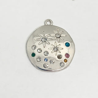 Silver plated round charm with 15 colored and clear crystals and 3 engraved stars.