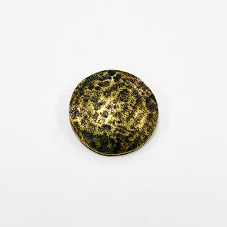 Small round hammered antique gold button.
