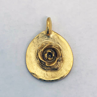 Gold plated teardrop pendant with 3D rose on it.