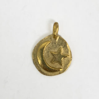 Satin Gold plated round charm with an embossed crescent moon and star on it.