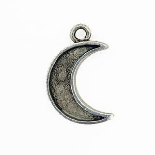 Front side of textured silver tone crescent charm with lip.
