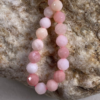 Peruvian Pink Opal 5mm faceted round beads strand.
