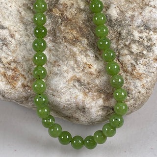 Jade Natural 6mm round beads strand.