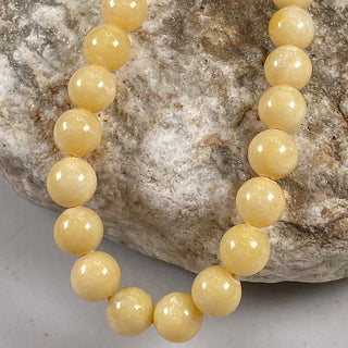 Burmese Yellow Jade 8mm round beads strand.