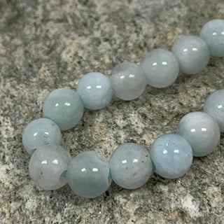 Aquamarine round 6mm beads strand.