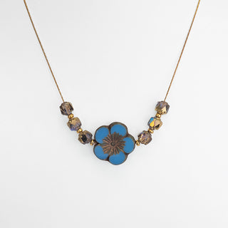 Beginner necklace kit with gold plated accents, blue Czech glass flower bead, and facetted beads.