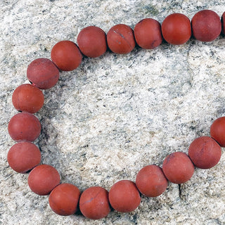 Large hole strand of 8mm matte red jasper round beads.