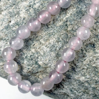 Large hole strand of 8mm rose quartz round beads.
