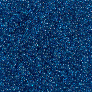 15/0 Transparent Capri Blue Seed Beads.
