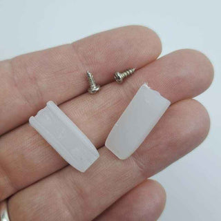replacement nylon jaws for nylon jaw pliers on a person's hand on a white background