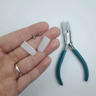 replacement nylon jaws for nylon jaw pliers on a person's hand on a white background