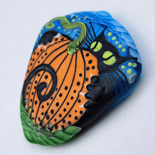 Lampwork glass bead of black cat with pumpkin