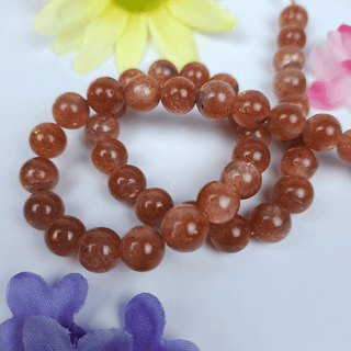 orange and peach colored sunstone gemstone beads