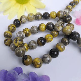 yellow, grey, and black bumblebee jasper gemstone beads