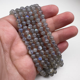 Labradorite (light) 5mm Round 15.5in Strand in hand