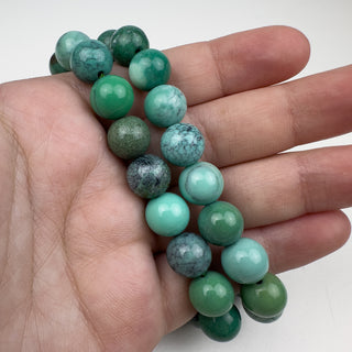 Green Opal 10mm Round 15.5in Strand in hand