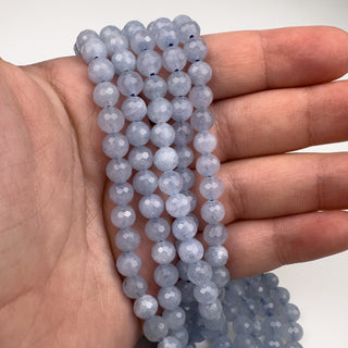 Blue Aquamarine (dark) Faceted 6mm Round 15.5in Strand in hand