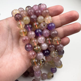 Spinel 10mm 15.5in Round in hand