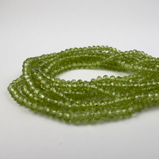 AAA Peridot 3x2mm Rondelle Faceted 15.5in Strand