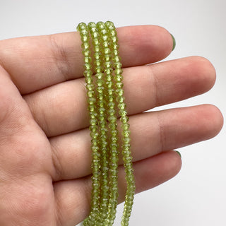 AAA Peridot 3x2mm Rondelle Faceted 15.5in Strand