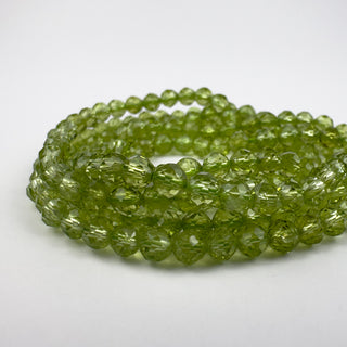 AAA+ Peridot 4mm Round Faceted 15.5in Strand
