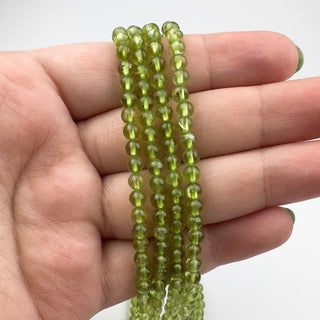 AAA Peridot 4mm Round 15.5in Strand