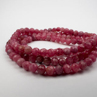 AAA Thulite 4mm Round Faceted 15.5in Strand