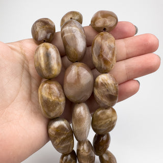 Sunstone 18x22-26mm Oval Nuggets 15in Strand