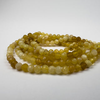 Yellow Opal 4mm Round Faceted 15in Strand
