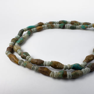 Turquoise 3-5x7-9mm Barrel-like 15in Strand