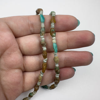 Turquoise 3-5x7-9mm Barrel-like 15in Strand