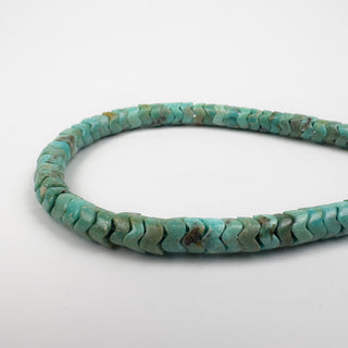 Turquoise 3x6mm Handcut Snake 16in Strand