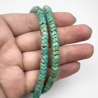 Turquoise 3x6mm Handcut Snake 16in Strand