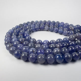 AA Tanzanite 5.5mm Round 15in Strand