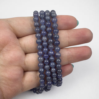 AA Tanzanite 5.5mm Round 15in Strand