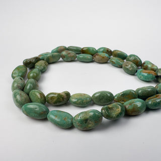 Elisa Turquoise approx. 7x10.5mm Nuggets 15.5in Strand