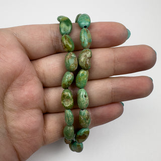 Elisa Turquoise approx. 7x10.5mm Nuggets 15.5in Strand