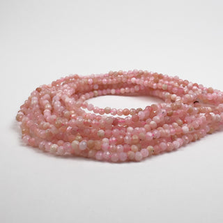 Opal Pink 2mm Round Faceted 15in Strand