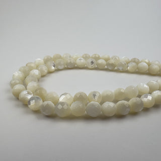 Mother of Pearl 7.5mm Round Faceted 15in Strand