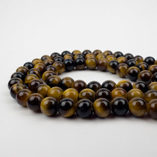 Tiger Eye Brown 6.5mm Round Large Hole 7.5in Strand