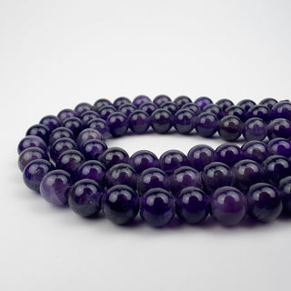 Amethyst 8.5mm Round Large Hole 7.5in Strand