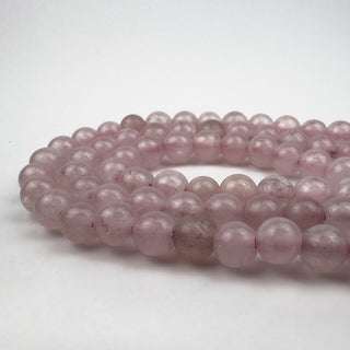 Quartz Rose 8.5mm Round Large Hole 7.5in Strand