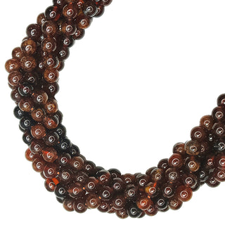 Strands of 6mm round  Hessonite Garnet.