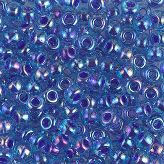 Closeup of size 6/0 Cobalt Silver Lined Sapphire AB Miyuki seed beads.