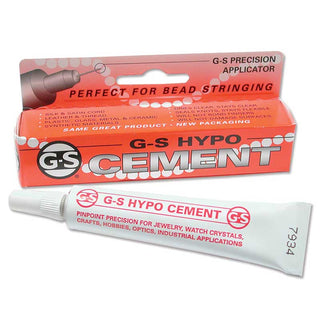 G-S Hypo Cement precision applicator shown with its retail box and a white squeeze tube on a plain white background.