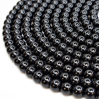 Strands of 6mm round Black Tourmaline.